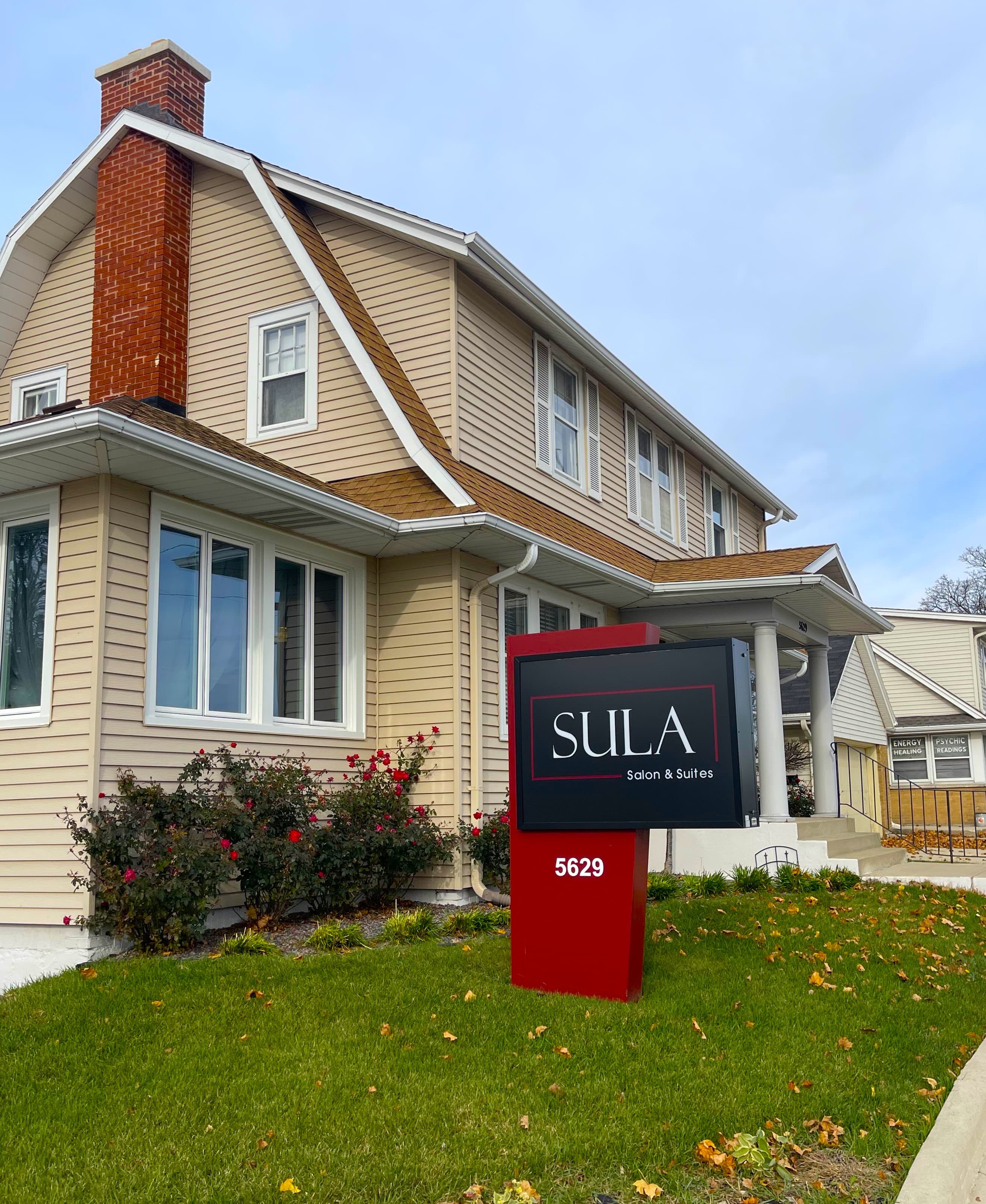 Interior of Sula Salon showing modern styling stations and professional equipment